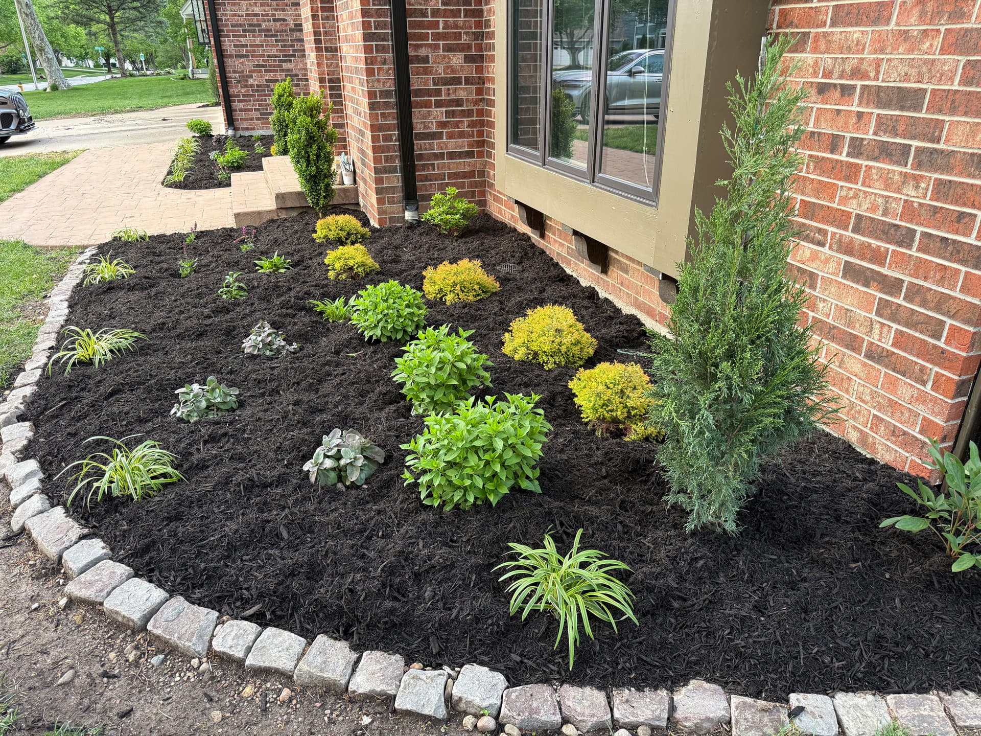 Gallery photos for New Trees, Perennials and Fresh Mulch Boost Curb Appeal in Leawood: Image #1