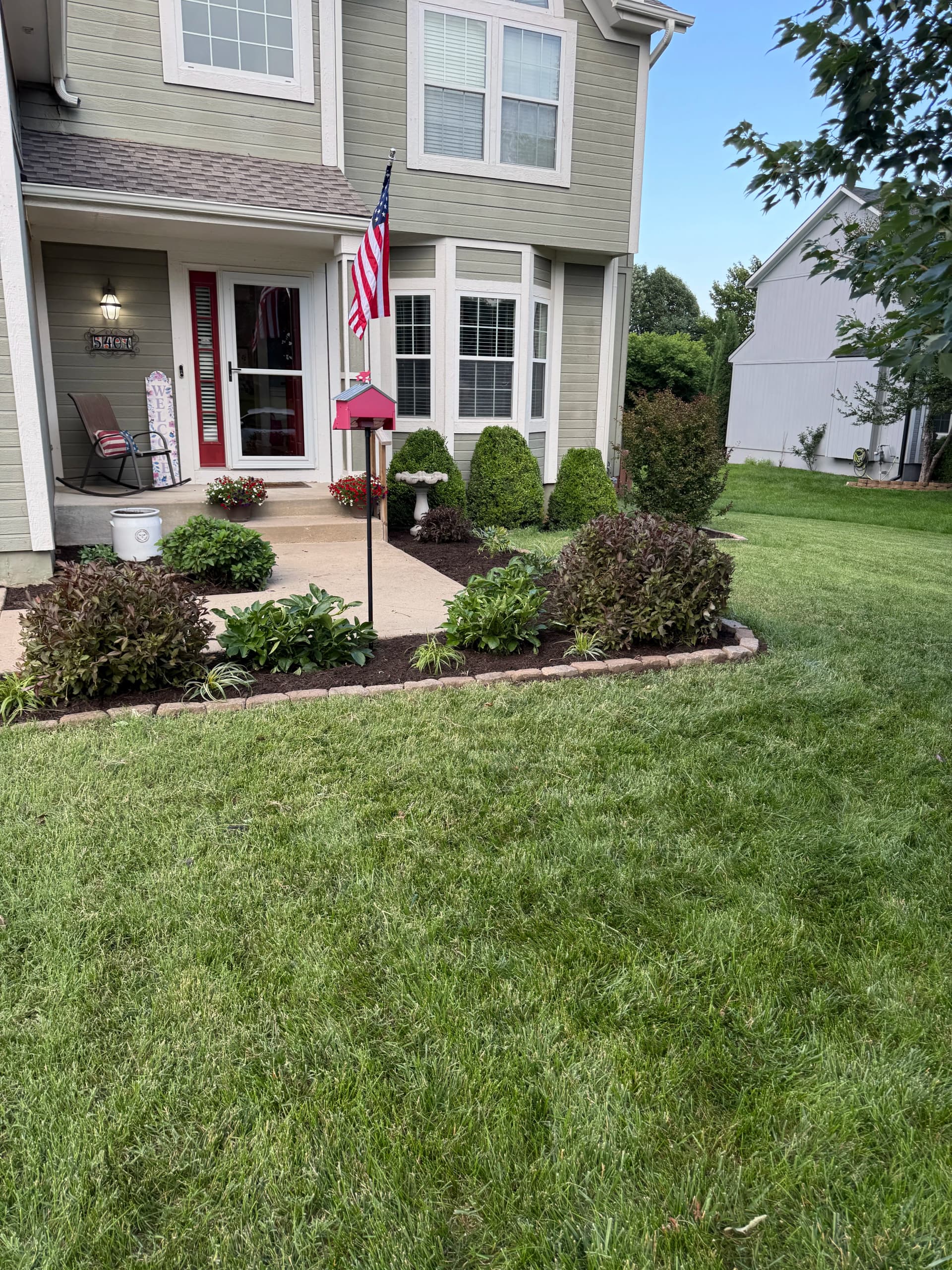 Fresh Mulch and Clean Edging That Sells a Home Before the Sign Goes Up image