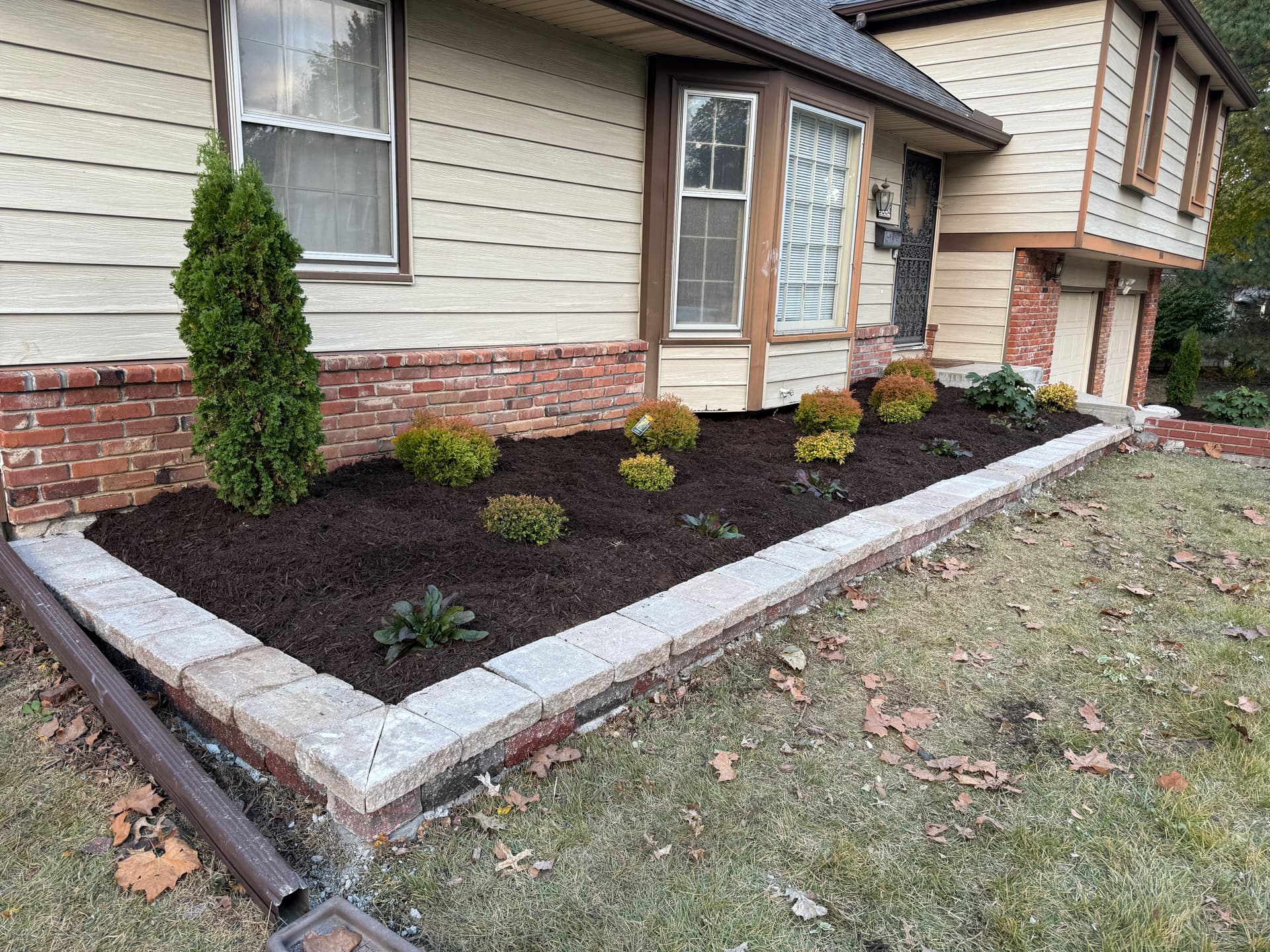 Gallery photos for Curb Appeal Boost with Fresh Plants and Mulch in Overland Park: Image #1