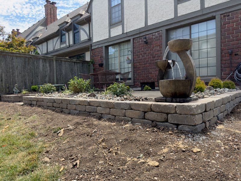 Gallery photos for Serene Backyard Oasis with New Patio and Plants: Image #1