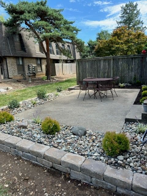Gallery photos for Serene Backyard Oasis with New Patio and Plants: Image #2