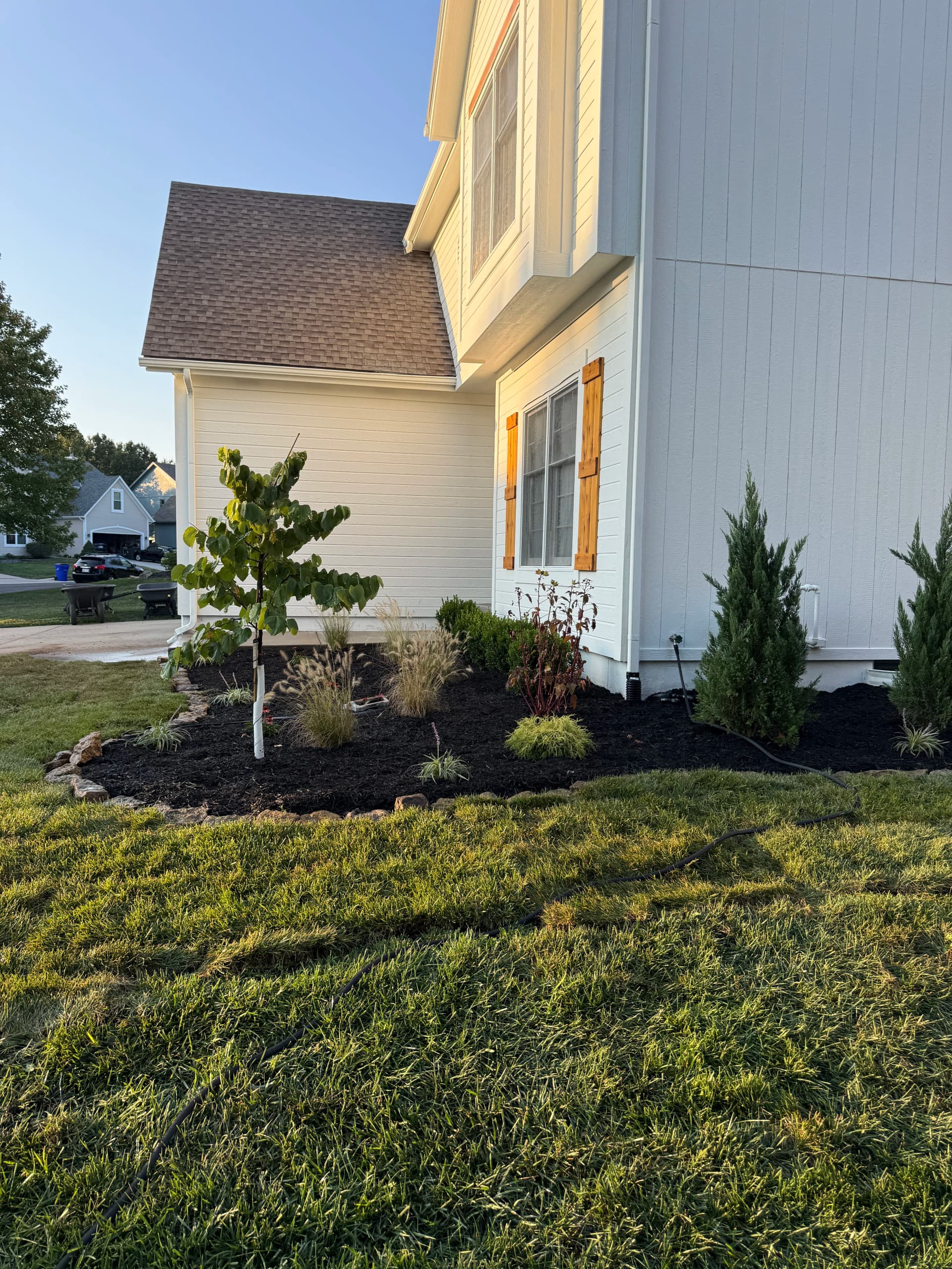 Gallery photos for Fresh Planting Beds and Mulch Boost Curb Appeal in Olathe: Image #2