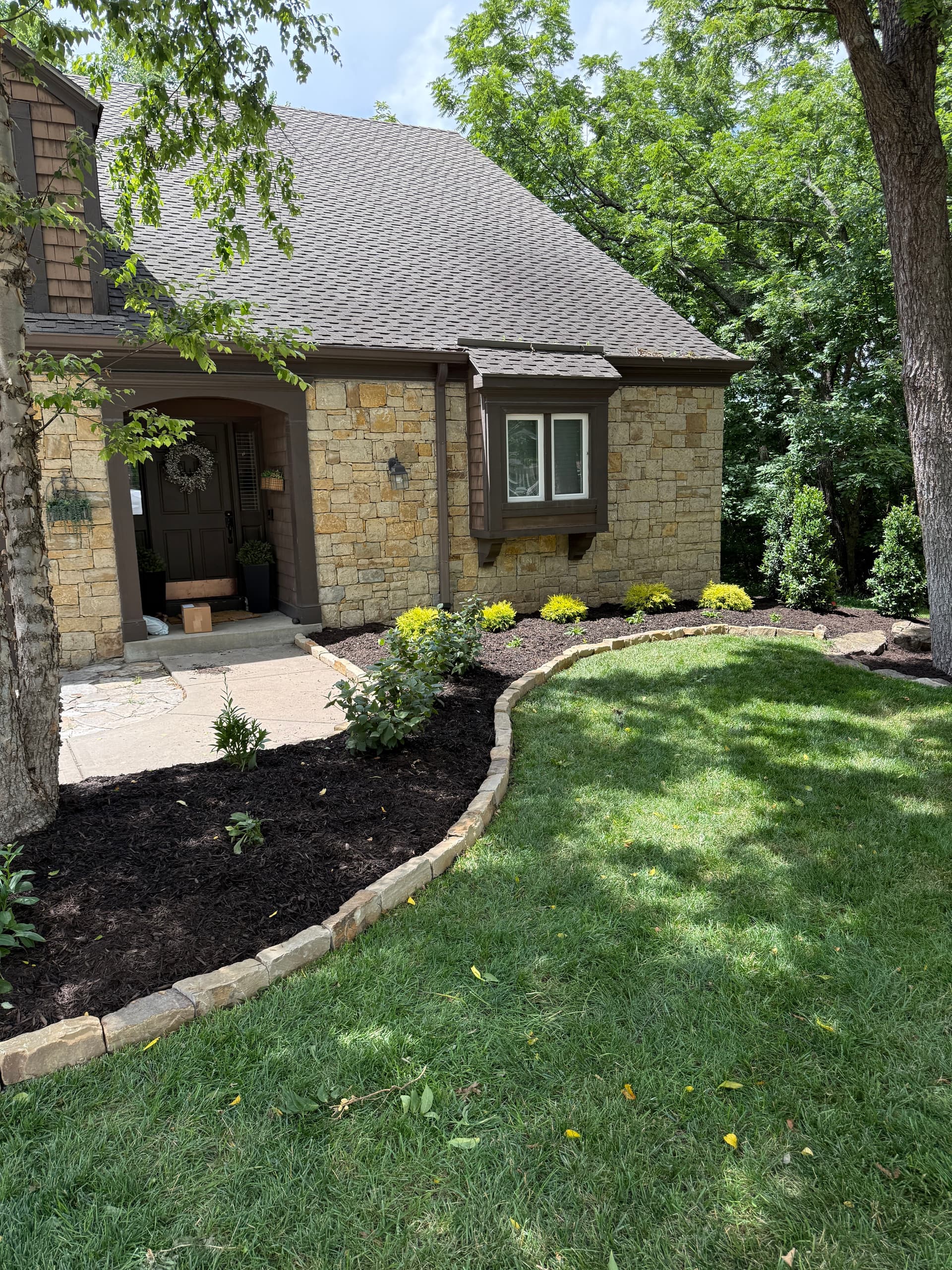 Gallery photos for Stone Edging, Shrubs, and Mulch Give This Lenexa Home a Clean Reset: Image #2