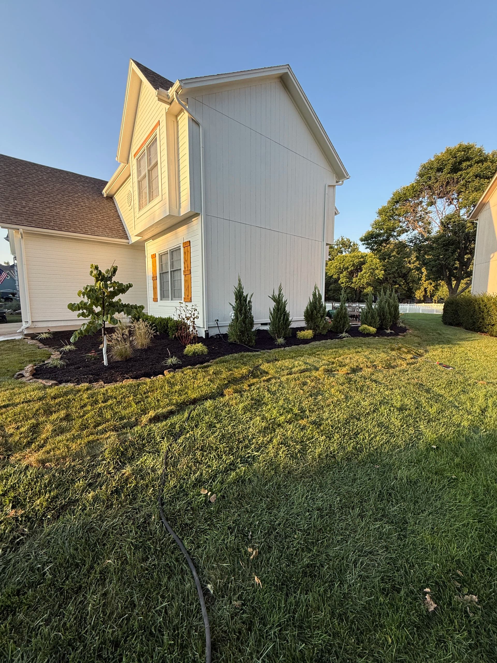 Gallery photos for Fresh Planting Beds and Mulch Boost Curb Appeal in Olathe: Image #3