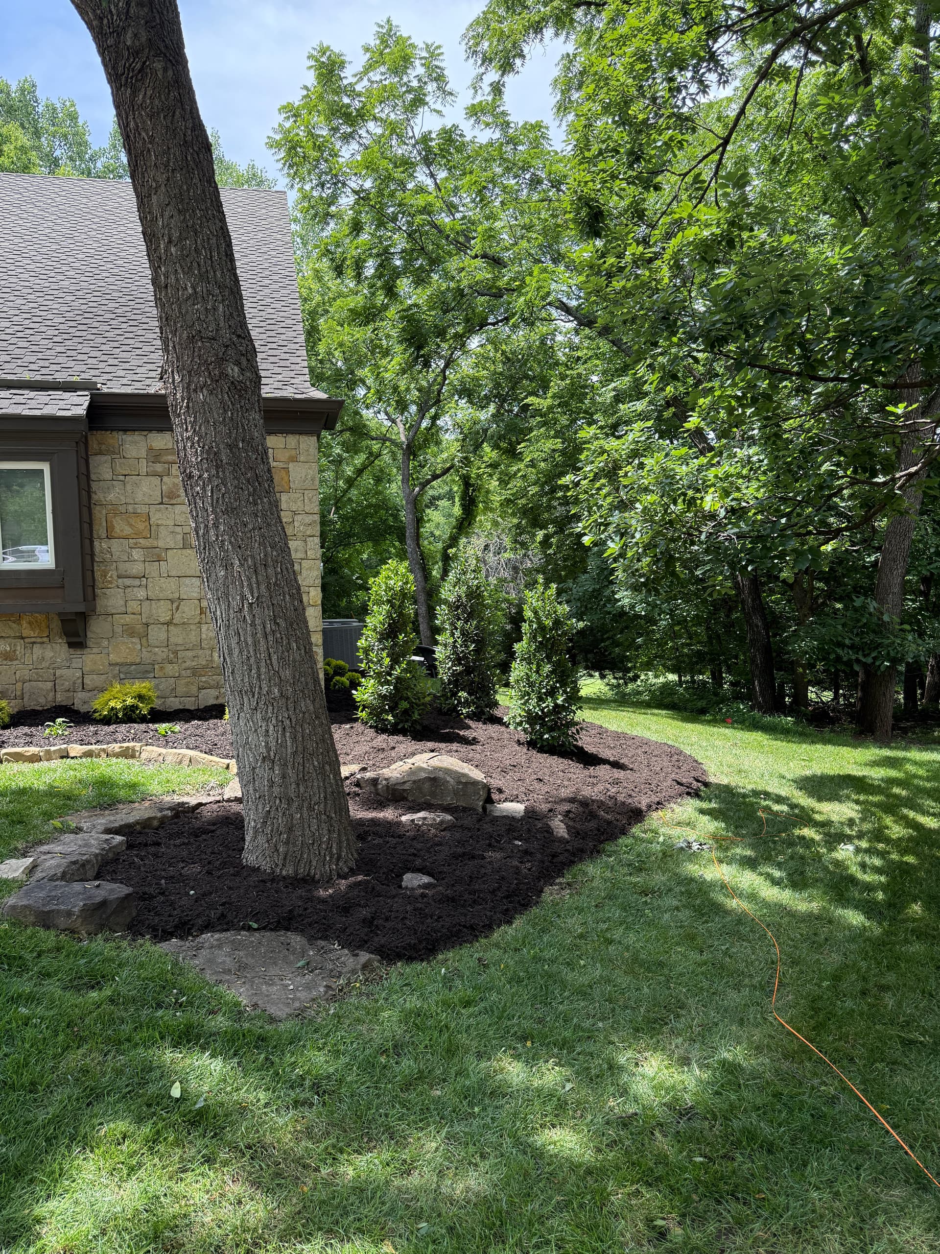 Gallery photos for Stone Edging, Shrubs, and Mulch Give This Lenexa Home a Clean Reset: Image #3